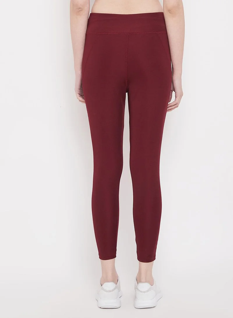Clovia Red High Rise Activewear Tights in Maroon for Women | Best Price UAE